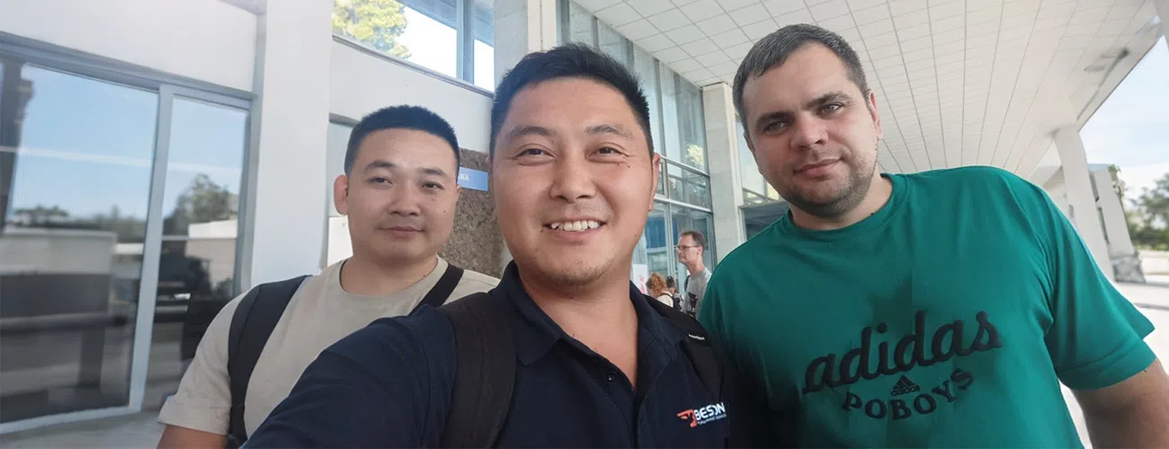 A photo of BESTON RIDES engineers with Russian clients