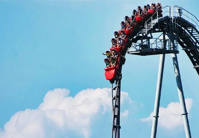 Roller Coaster Going Over a Hill Crest and Delivering a Weightless Sensation