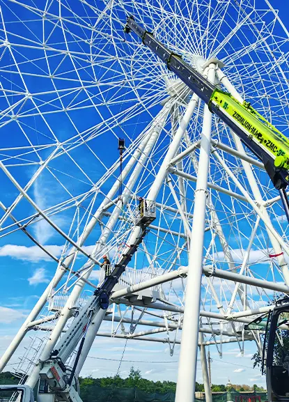 Mobile Crane Assisting 50m Ferris Wheel Installation in Tver, Russia