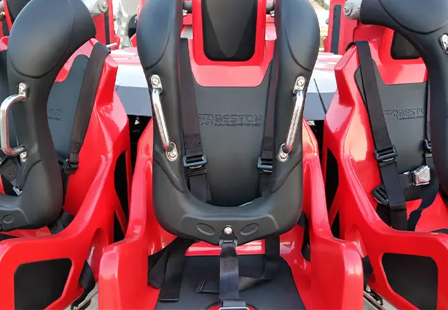 Close up of Beston Pendulum Ride Seat with Shoulder Harness and Seat Belt