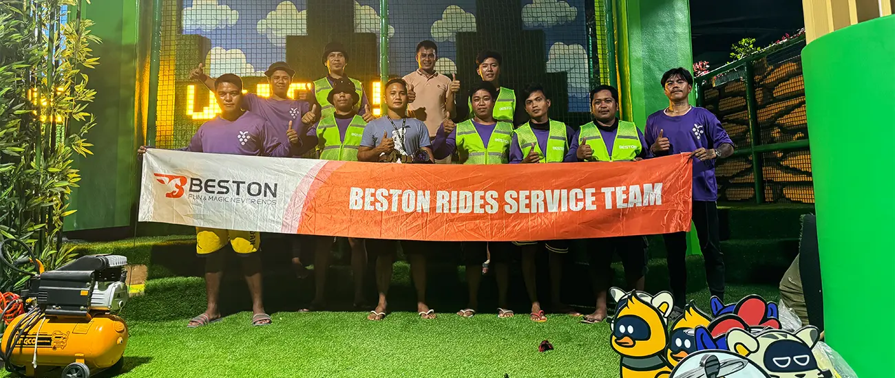 Beston Rides Service Team and The Client's Staff Celebrating the Project Delivery