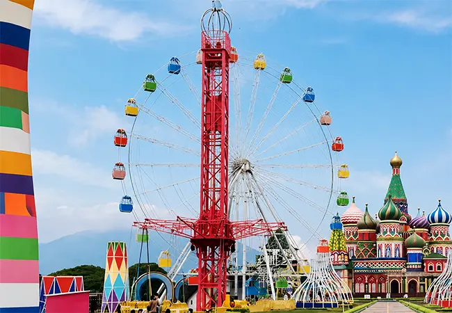 Beston Swing Tower Standing in Front of the Ferris Wheel at Florawisata D’Castello